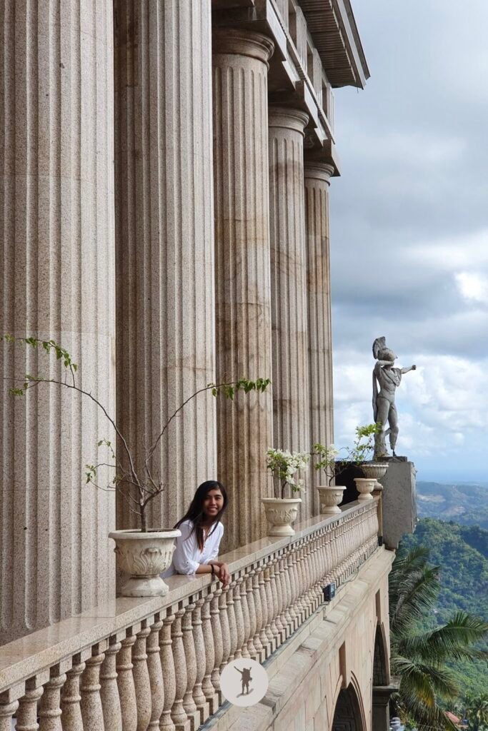 Our Visit to Cebu City Highlands: Takeaways to Make Your Trip More Unforgettable 44 The massive columns of the Temple of Leah and my friend, Cebu City highlands, Cebu, Philippines