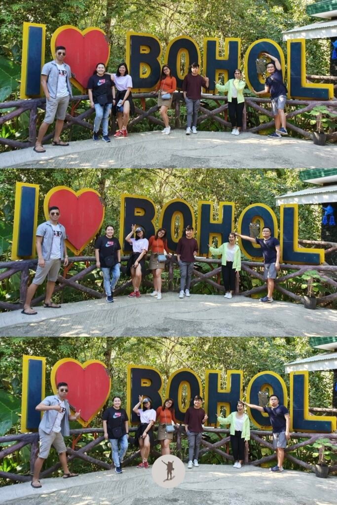 Our group photo in front of the I Heart Bohol sign near the start of the trail in the Tarsier Conservation Area, Bohol, Philippines