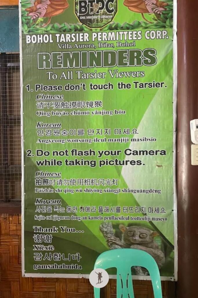 Reminders for visitors in different languages when seeing the tarsiers in the Conservation Area, Bohol, Philippines
