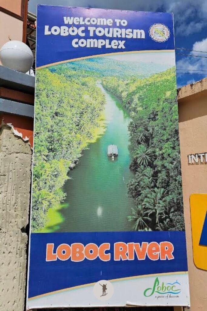 Tarp outside Loboc Tourism Complex showing the floating restaurant cruising in the middle of the jungle, Bohol, Philippines