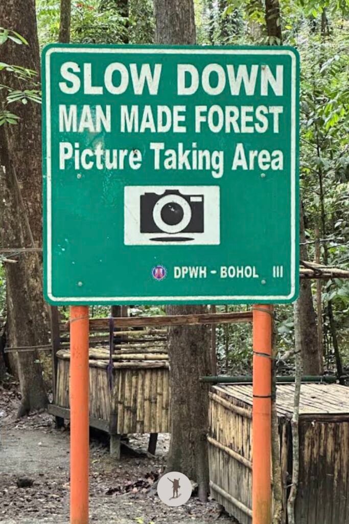The sign telling the drivers to slow down along Bilar Man-Made Forest, Bohol, Philippines